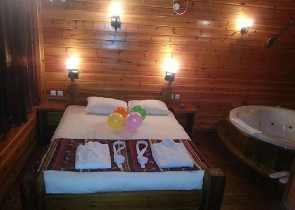 Musical Garden Cabins Ramot Rum bild